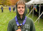  Patrick Ford posing with medal around his neck