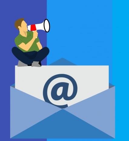 Man with bullhorn sitting on top of an open envelope 